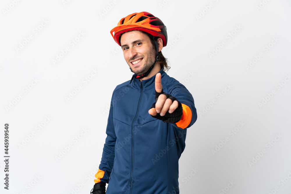 Young cyclist man isolated on white background showing and lifting a finger Young cyclist man isolated on white background showing and lifting a finger