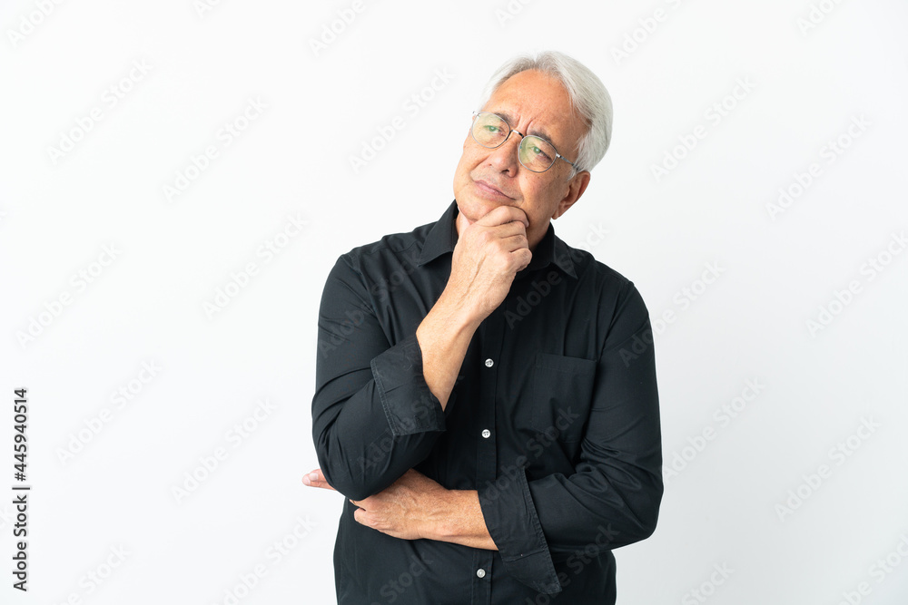 Middle age Brazilian man isolated on white background having doubts Middle age Brazilian man isolated on white background having doubts