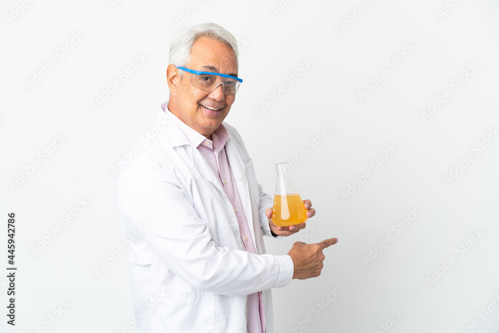 Middle age Brazilian scientific man scientific isolated on white background pointing back Middle age Brazilian scientific man scientific isolated on white background pointing back