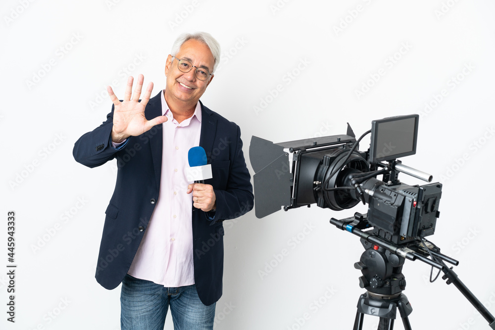 Reporter Middle age Brazilian man holding a microphone and reporting news isolated on white background counting five with fingers