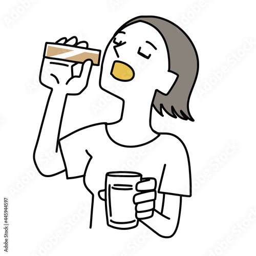 薬を飲む女性