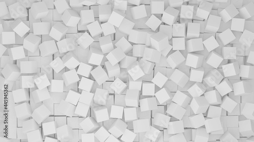 Multiple white cubes arranged randomly forming an abstract background.