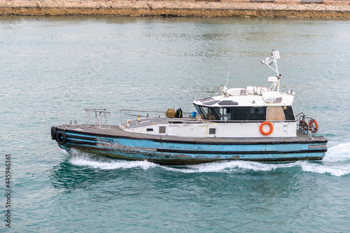 Pilot boat in Suez canal  Egypt. Work at sea. Commercial shipping.