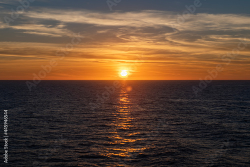 Sunset at sea. Seascape, blue sea.  Calm weather. View from cargo vessel. © Alexey Seafarer