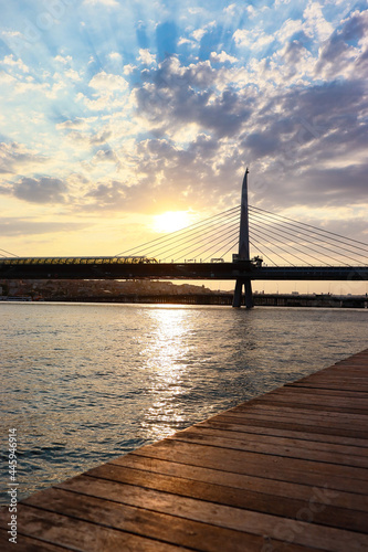Fototapeta Naklejka Na Ścianę i Meble -  sunset over the pier,sunset over the bridge