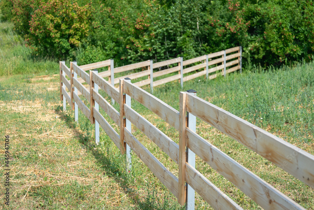 Wooden fence (fence) of the site.