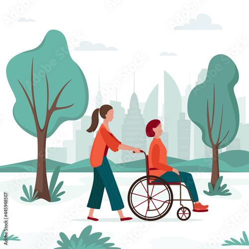 Disabled woman in wheelchair walking in the city park with an accompanying person. Outdoor activity. Social worker or volunteer with seniors