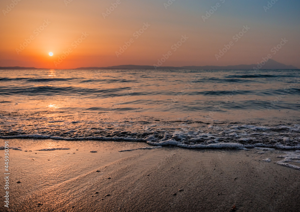 sunrise on the beach with waves