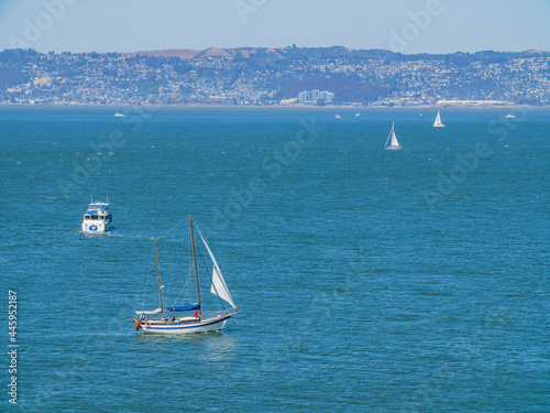 Sunny view of a ship driving in the San Francisco Bay