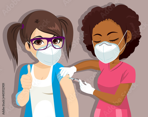 Positive thumb up teenager girl being vaccinated COVID safe back to school concept