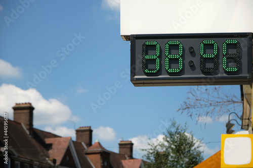 A digital thermometer in London showing the temperatures during the UK heat wave. It reads 38  °C (degree Celsius).