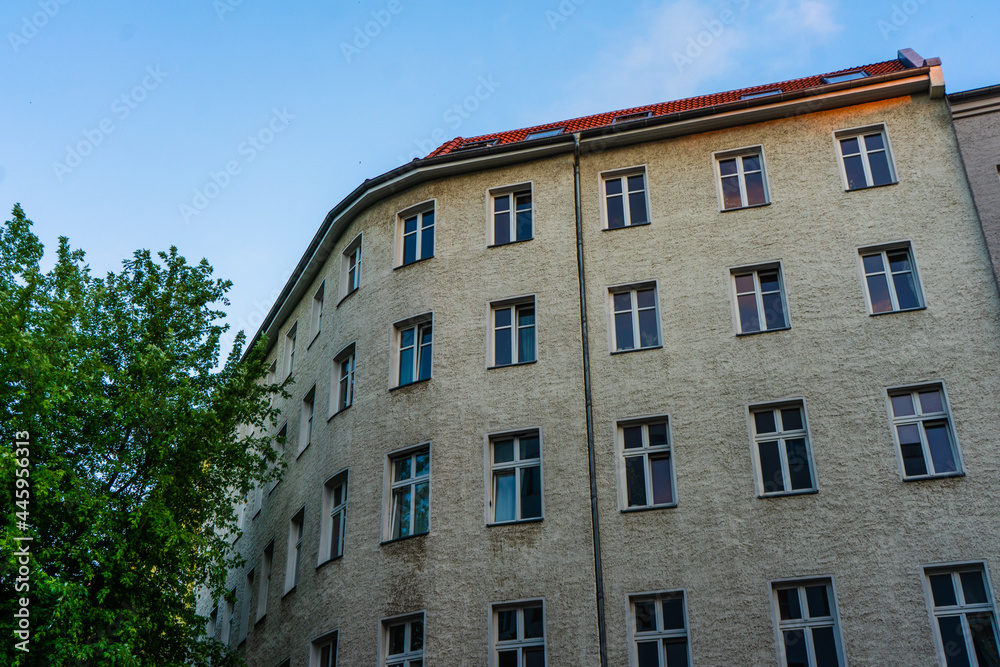 brown apartment corner building brown apartment corner building