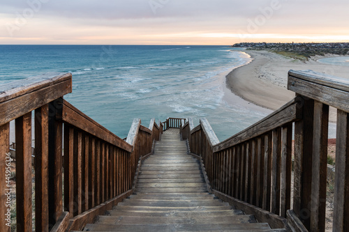 Sunrise ove the iconic boardwalk at southport port noarlunga south australia on may 18th 2021