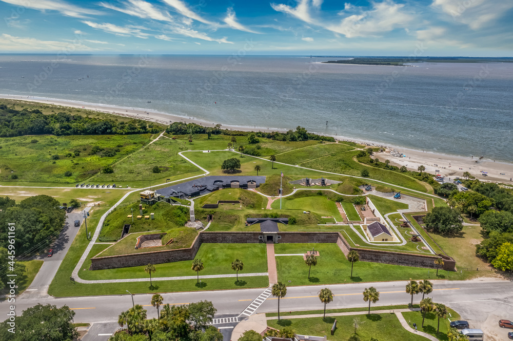 Fototapeta premium Aerial view of Fort Moultrie on Sullivan's island Charleston, South Carolina from the American Revolutionary war protecting the harbor with gun battery blue cloudy sky
