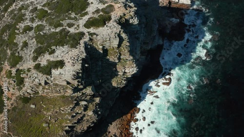 Top View Of Rugged Landscape Of The Rocky Cliff At The Coast Of Cape Town, Africa. aerial