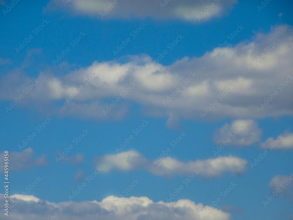 Obraz premium Beautiful blue sky with white clouds, copy space