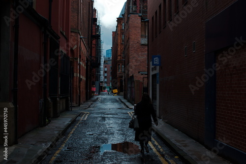 Women walking in a backstreet in the UK  England Manchester