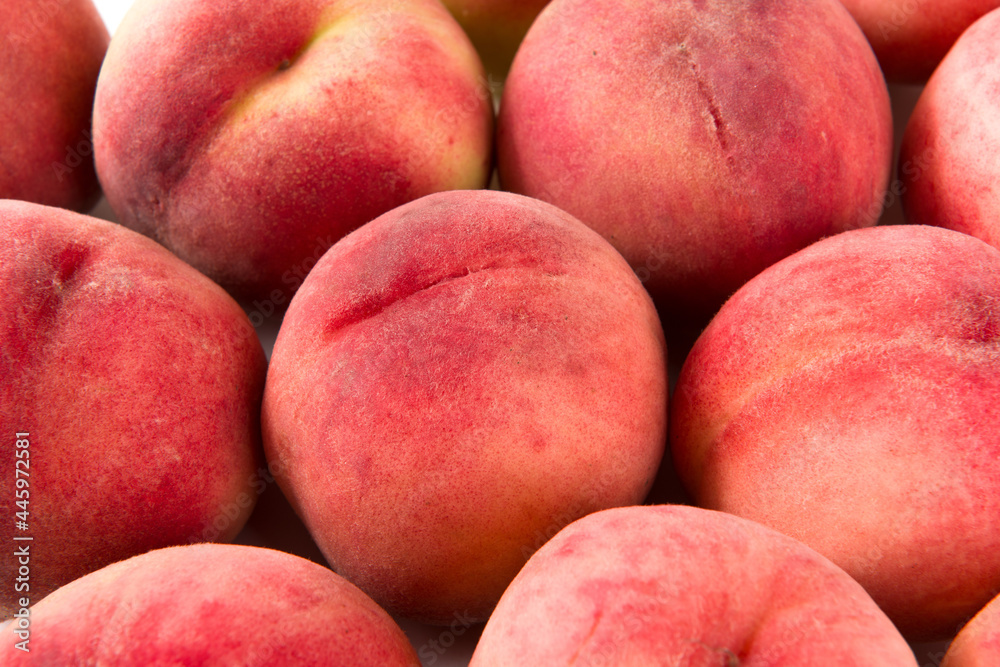 Ripe peach fruit close-up on white background Ripe peach fruit close-up on white background