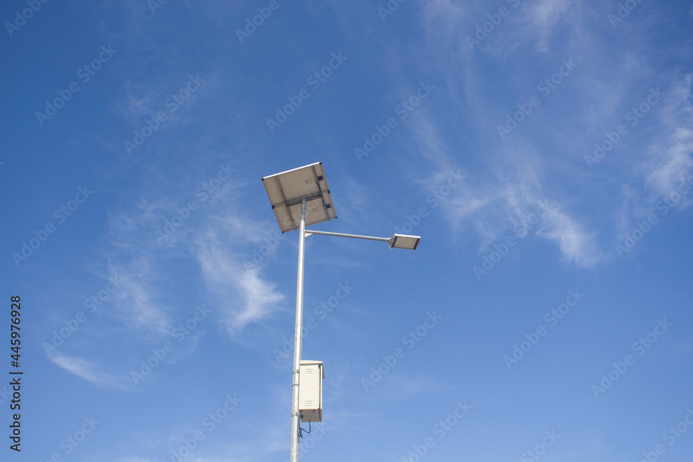 solar panel street light on blue sky background solar panel street light on blue sky background