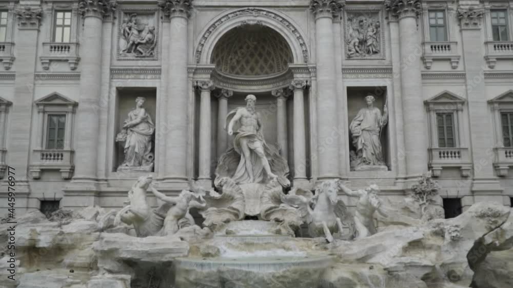 Pan down to reveal Trevi Fountain Rome Italy on overcast day Pan down to reveal Trevi Fountain Rome Italy on overcast day