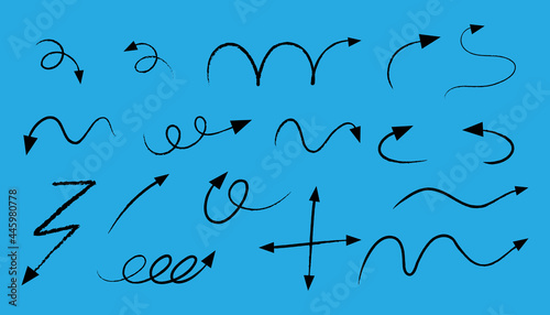 Different types of hand drawn curved arrows on blue background