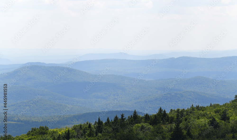 landscape of mountain range in summer mist landscape of mountain range in summer mist