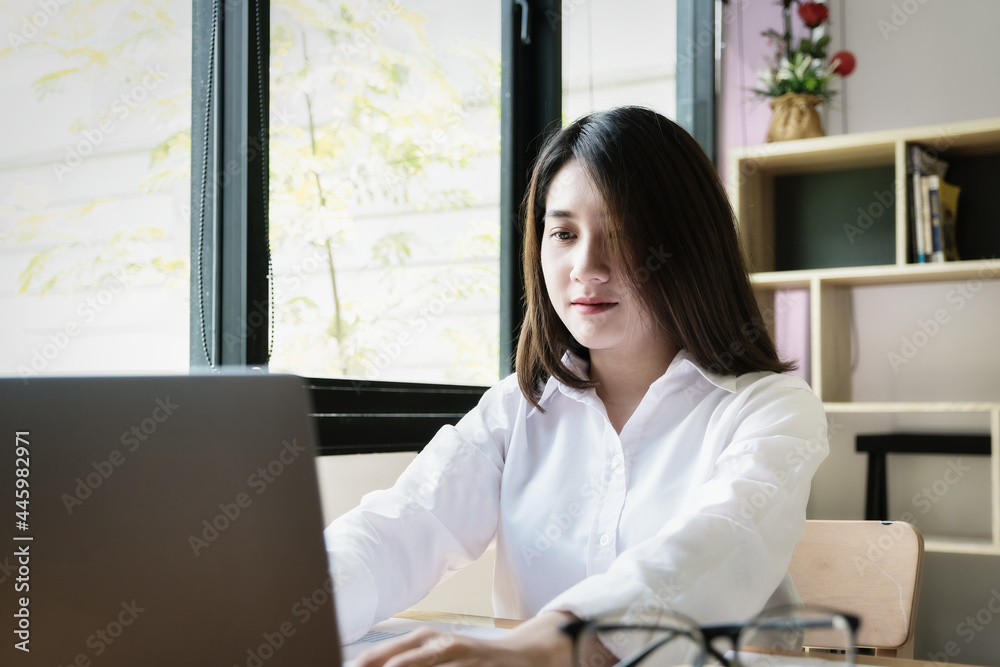 freelance concept,female using computers to design work as ordered by customers at home. freelance concept,female using computers to design work as ordered by customers at home.