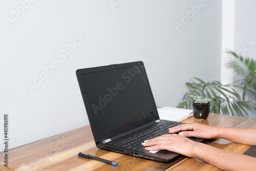 person working on laptop computer