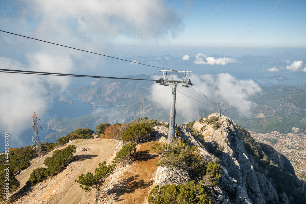 Babadag mountain with cable car to Oludeniz and Fethiye cities in Turkey. Babadag mountain with cable car to Oludeniz and Fethiye cities in Turkey.