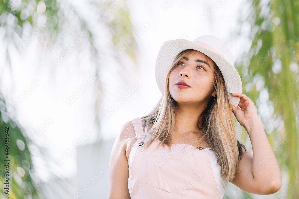 Mexican woman wearing hat, summer vacations Mexican woman wearing hat, summer vacations