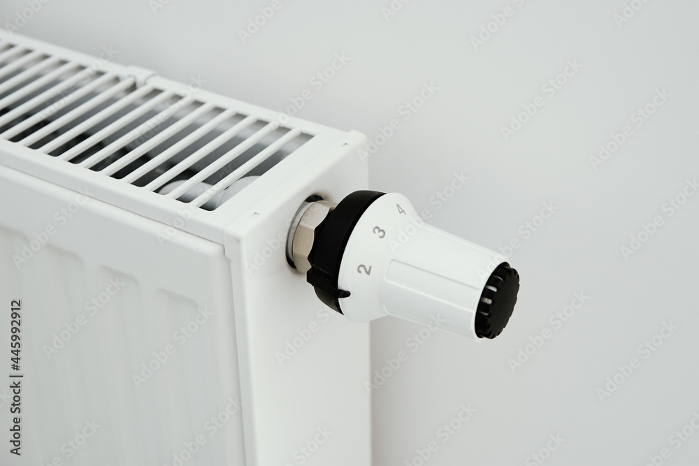 Heat radiator knob. Adjusting temperature on heating radiator Heat radiator knob. Adjusting temperature on heating radiator