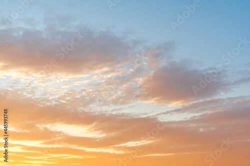sunset sky with clouds. orange sky © Tishina