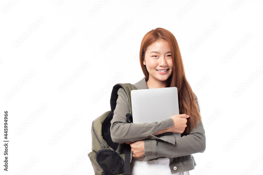 Portrait of happy casual Asian girl student with backpack and laptop isolated on white background. Back to school and learning concept. Portrait of happy casual Asian girl student with backpack and laptop isolated on white background. Back to school and learning concept.