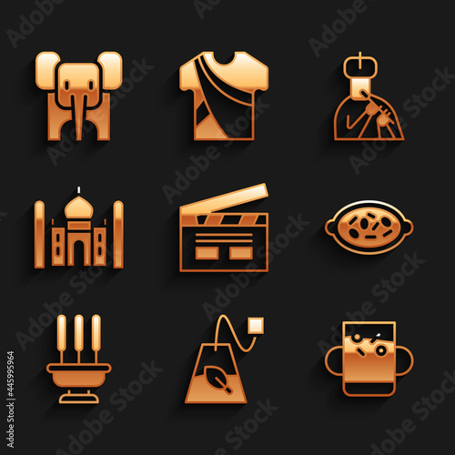 Set Bollywood indian cinema, Tea bag, Cup of tea and leaf, Kheer bowl, Incense sticks, Taj Mahal, Indian man plays flute and Elephant icon. Vector