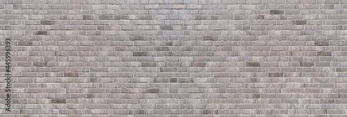 Panorama Backsteinmauer Hintergrund aus grauen Ziegelsteinen in verschiedenen Farbtönen 