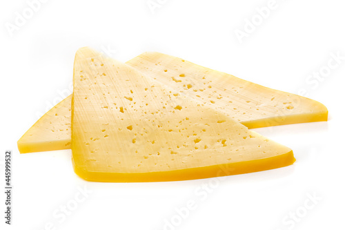 Photos Pieces of semi-hard or hard yellow cheese with holes isolated on a white background