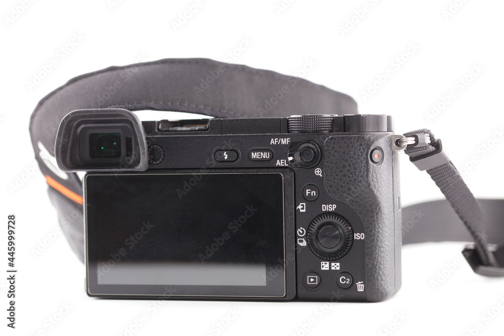 Black mirrorless camera on white background Black mirrorless camera on white background