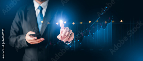 Money businessman touch virtual screen screen displaying a cryptocurrency featuring stock tickers or graphs. Stock trading platform concept. professional financial. Stock market data candlesticks.