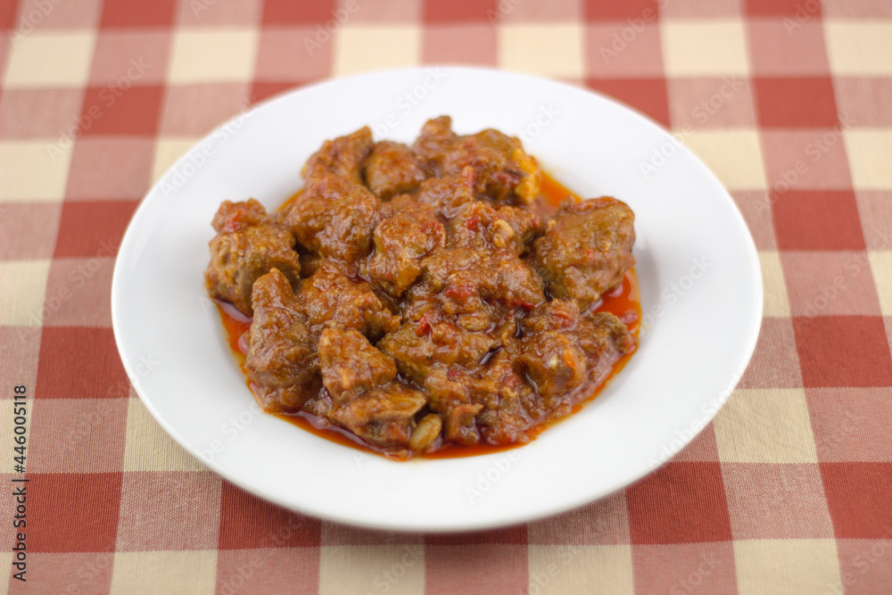 plato tipico de cerdo en salsa, typical spanish dish of pork in sauce plato tipico de cerdo en salsa, typical spanish dish of pork in sauce