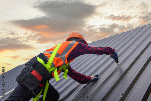 Roofer Construction worker install new roof,Roofing tools