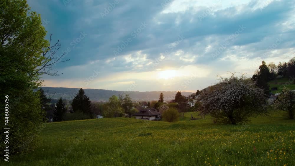 Timelapse Clouds. Sunset over the rolling hills. Canton Zurich. Switzerland. Timelapse Clouds. Sunset over the rolling hills. Canton Zurich. Switzerland.