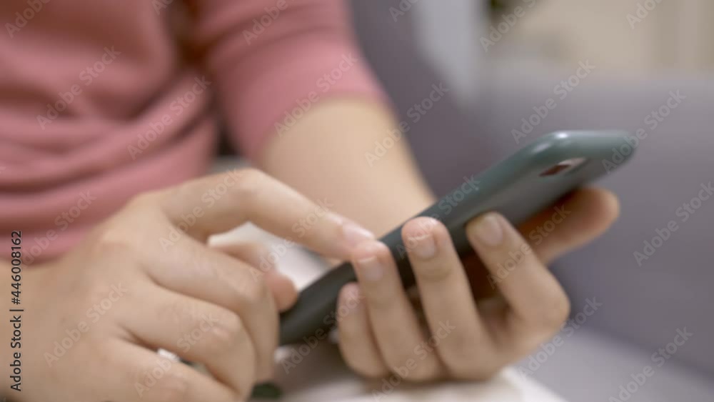 Close up focus on woman hands using a smartphone to social media. Technological addiction concept. Close up focus on woman hands using a smartphone to social media. Technological addiction concept.