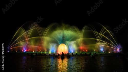 colorful fountain dancing in celebration of year with dark night sky background.