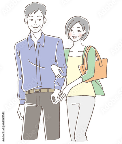 腕を組むシニア男女
