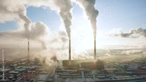 power plant pipes on the background of the panorama of the winter city Kirov against blue sky. photo