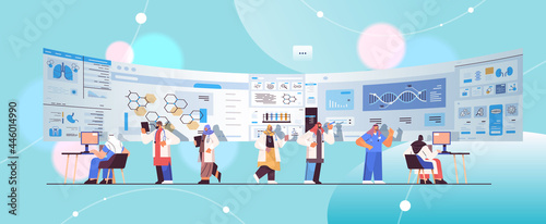 arab scientists team analyzing medical data on virtual board medicine healthcare concept