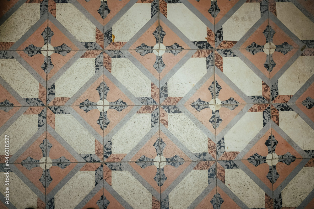 Diamond-shaped patterns on floor tiles