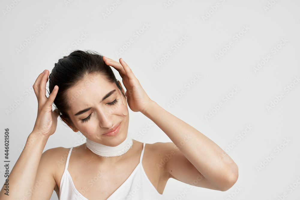 woman holding her head headache depression migraine woman holding her head headache depression migraine