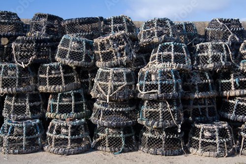 Lobster pots on the quayside - Newquay - Cornwall - England photo