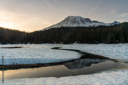 Reflection of the sunset over Mt. Ranier in Reflection Lake Mount Rainer National Park, Washington